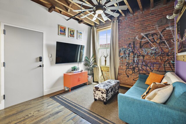610 21st Ave N Unit 101, Nashville, TN 37203 - living area featuring ceiling fan, wood finished floors, and baseboards