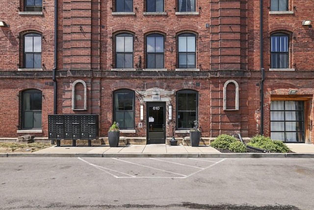 610 21st Ave N Unit 101, Nashville, TN 37203 - view of building exterior featuring uncovered parking