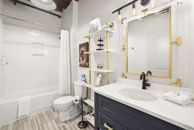 610 21st Ave N Unit 101, Nashville, TN 37203 - bathroom featuring toilet, vanity, and shower / bath combo with shower curtain