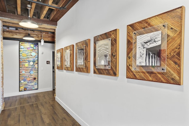 610 21st Ave N Unit 101, Nashville, TN 37203 - hallway featuring baseboards and dark wood-type flooring