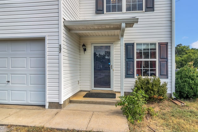 property entrance featuring a garage