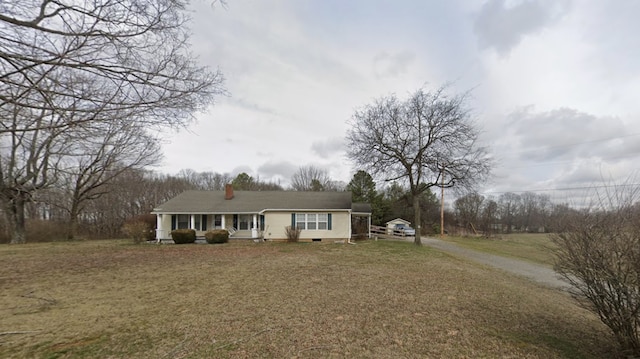 single story home with a front yard