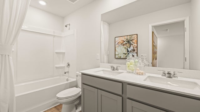 full bathroom with toilet, shower / tub combo, and vanity