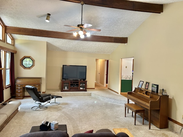 living room with a textured ceiling, ceiling fan, and light colored carpet