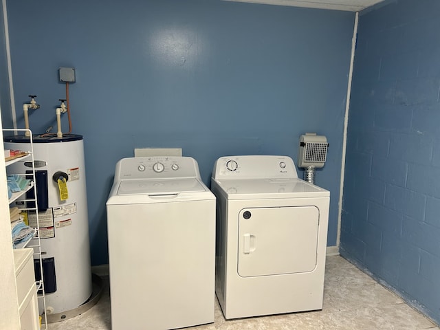 washroom with washer and dryer and electric water heater