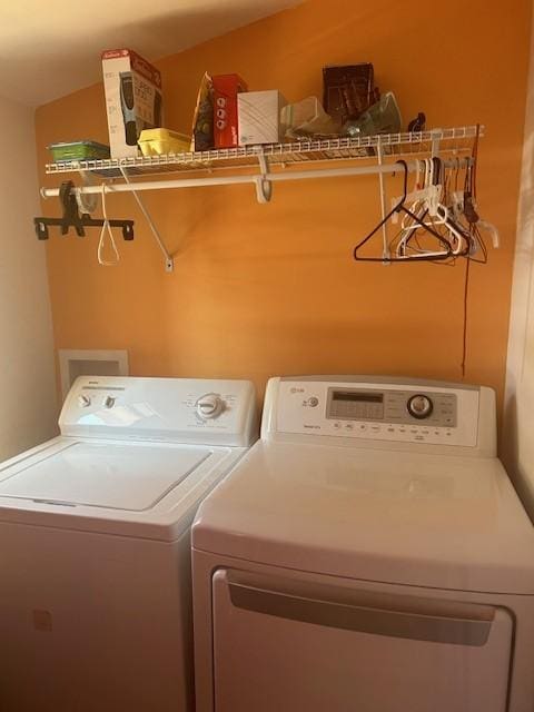 laundry room with laundry area and separate washer and dryer