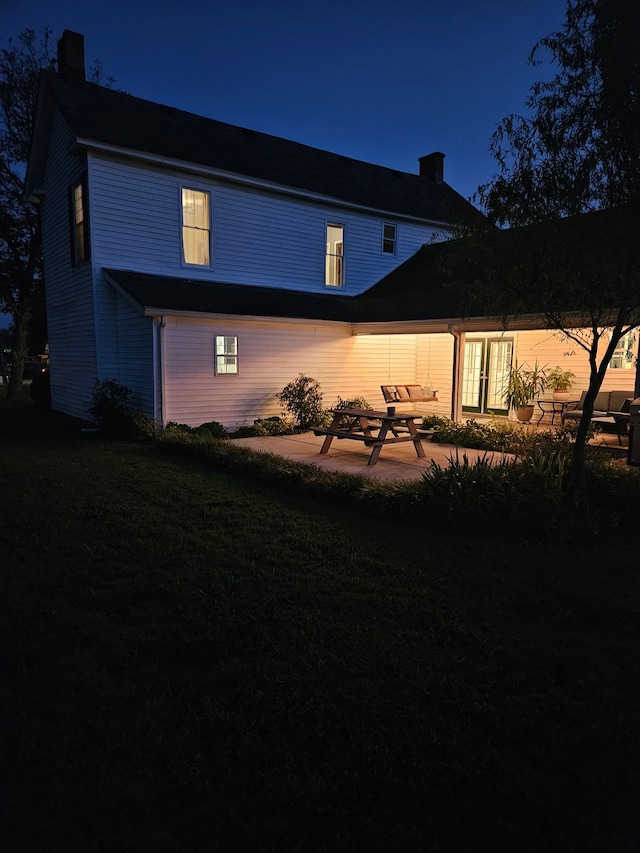 exterior space featuring a yard and a patio