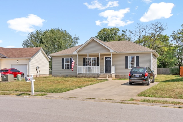 view of front facade featuring covered porch, a garage, and a front lawn