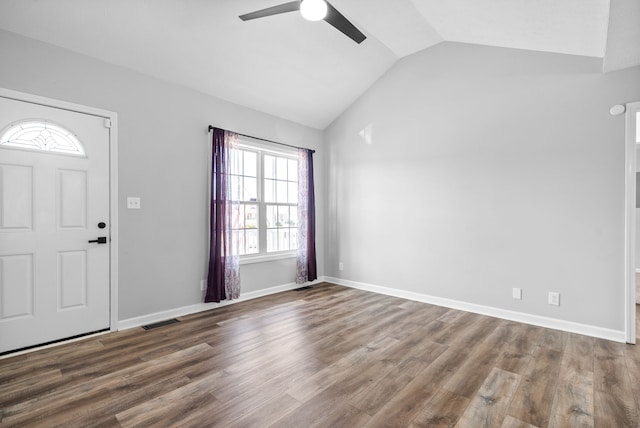 entrance foyer with vaulted ceiling, hardwood / wood-style flooring, and ceiling fan