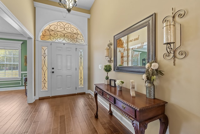 foyer with dark hardwood / wood-style floors