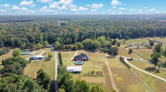 birds eye view of property featuring a rural view