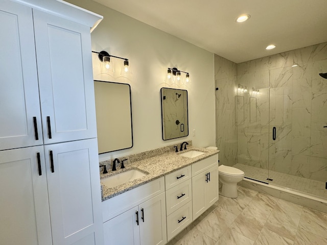 bathroom featuring vanity, toilet, and walk in shower