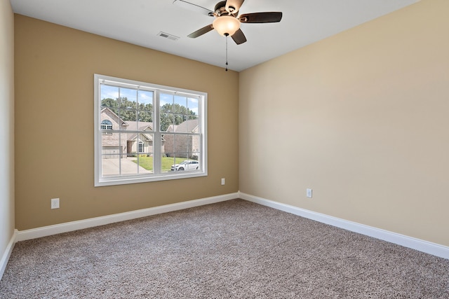 unfurnished room with carpet floors and ceiling fan