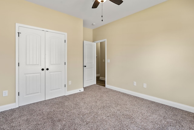 unfurnished bedroom featuring a closet, ceiling fan, and carpet floors