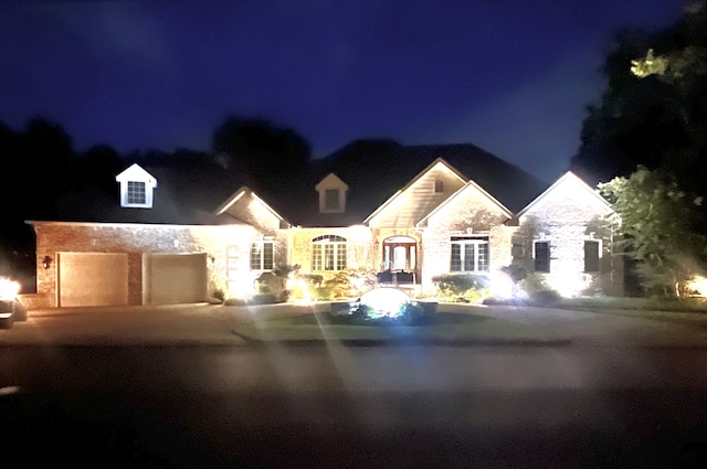 view of front of property with a garage