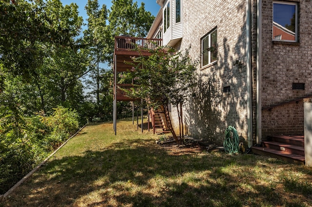 view of yard with a wooden deck