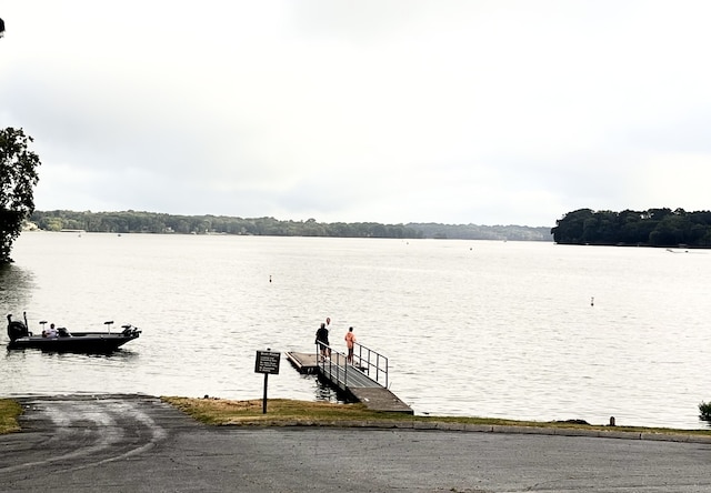 property view of water featuring a dock