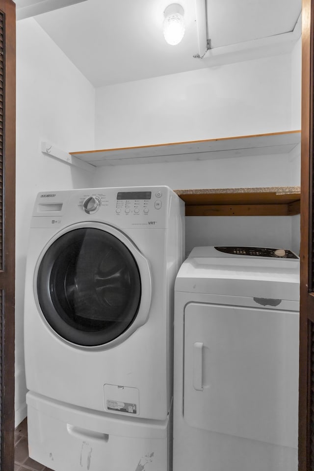 laundry room with separate washer and dryer