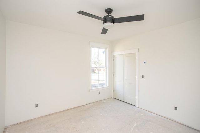 spare room with ceiling fan