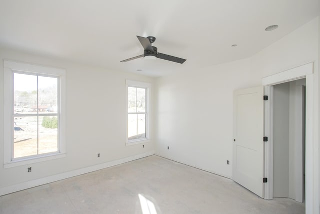 unfurnished room featuring ceiling fan