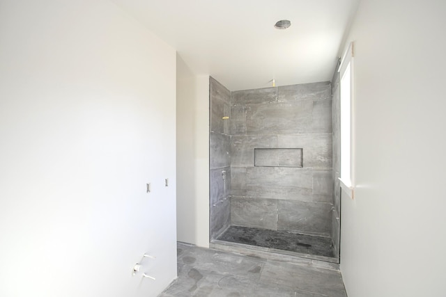 bathroom featuring walk in shower