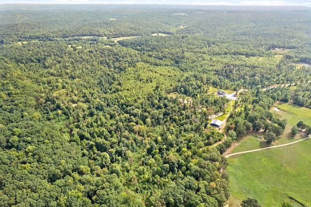 bird's eye view featuring a view of trees