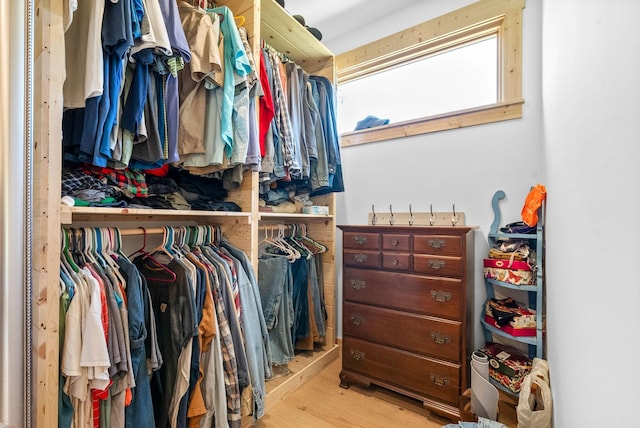 spacious closet with light wood-style floors