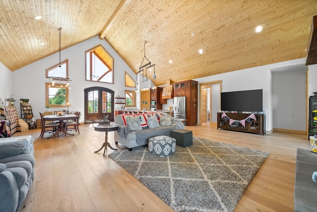 living room with arched walkways, wooden ceiling, french doors, light wood-style floors, and high vaulted ceiling