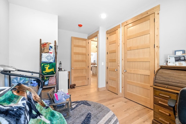 interior space featuring recessed lighting and wood finished floors