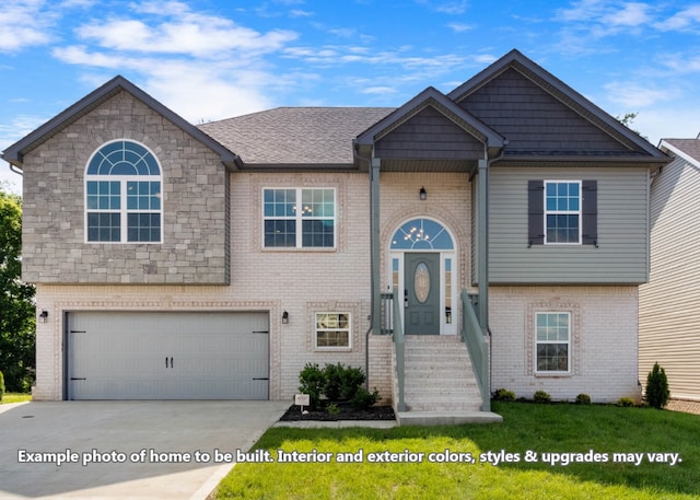 view of front facade featuring a garage and a front lawn