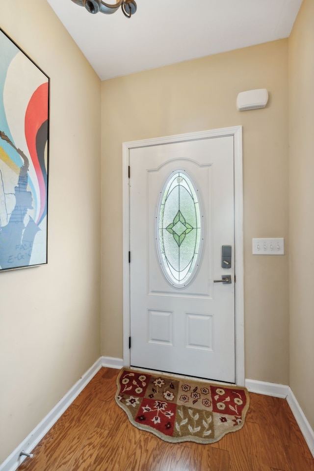 foyer entrance featuring hardwood / wood-style flooring