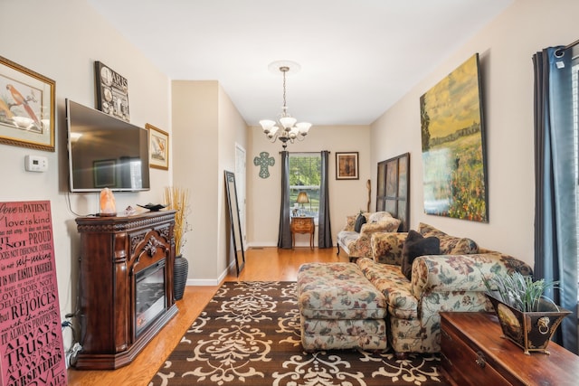 interior space with a chandelier and light hardwood / wood-style floors