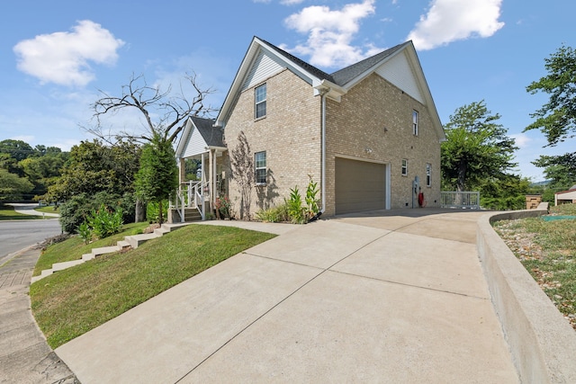 view of side of property featuring a garage