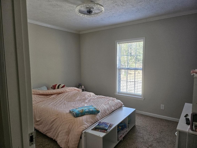 bedroom featuring a textured ceiling, crown molding, and dark carpet