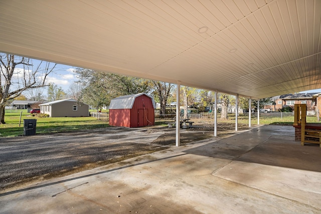 view of patio / terrace featuring a storage shed