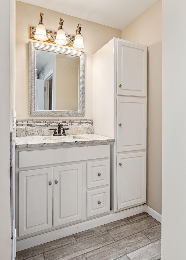 118 Van Buren St, Mcminnville, TN 37110 - bathroom with wood tiled floors and vanity