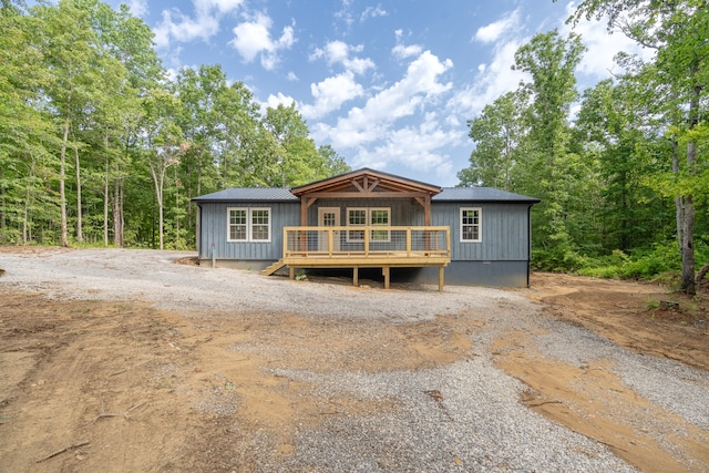 view of front of home featuring a wooden deck