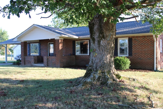 view of front of home with a front yard