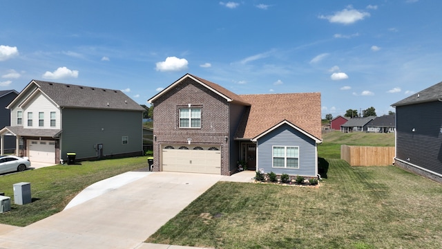 front of property with a garage and a front lawn