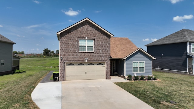 view of property with a garage and a front lawn