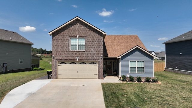 view of front property with a garage and a front yard