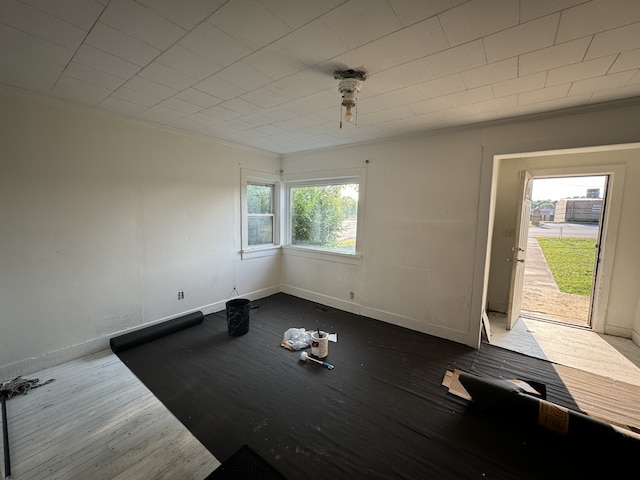 unfurnished room featuring hardwood / wood-style flooring