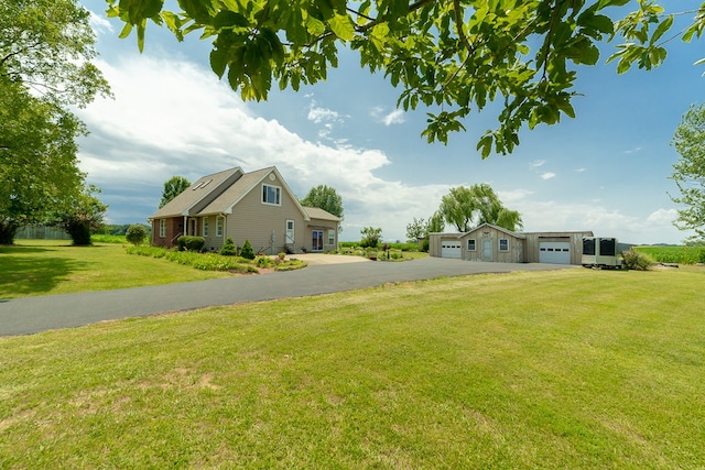 view of yard featuring a garage