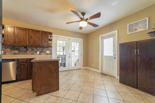 2409 Pepper Rd, Franklin, KY 42134 - kitchen with dishwasher, light tile patterned flooring, decorative backsplash, ceiling fan, and open shelves