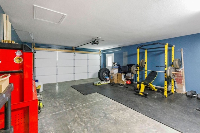 garage featuring a garage door opener