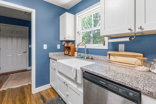 kitchen featuring dishwasher, light stone counters, sink, dark hardwood / wood-style floors, and white cabinets