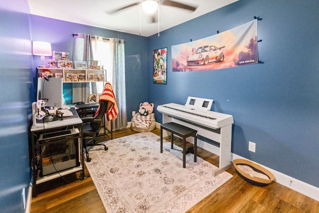 office space featuring ceiling fan and hardwood / wood-style floors