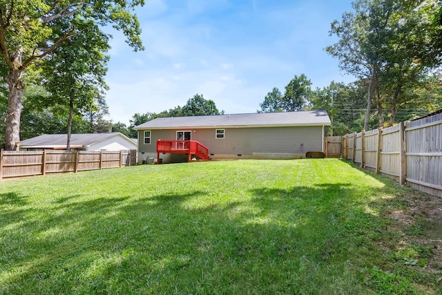 view of yard featuring a wooden deck