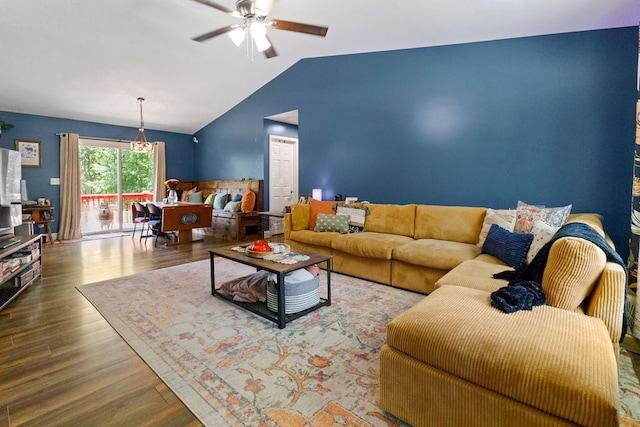 living room with lofted ceiling, wood-type flooring, and ceiling fan