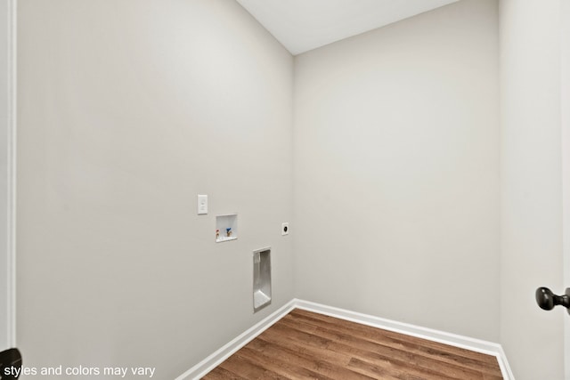 laundry room featuring washer hookup, electric dryer hookup, and wood-type flooring